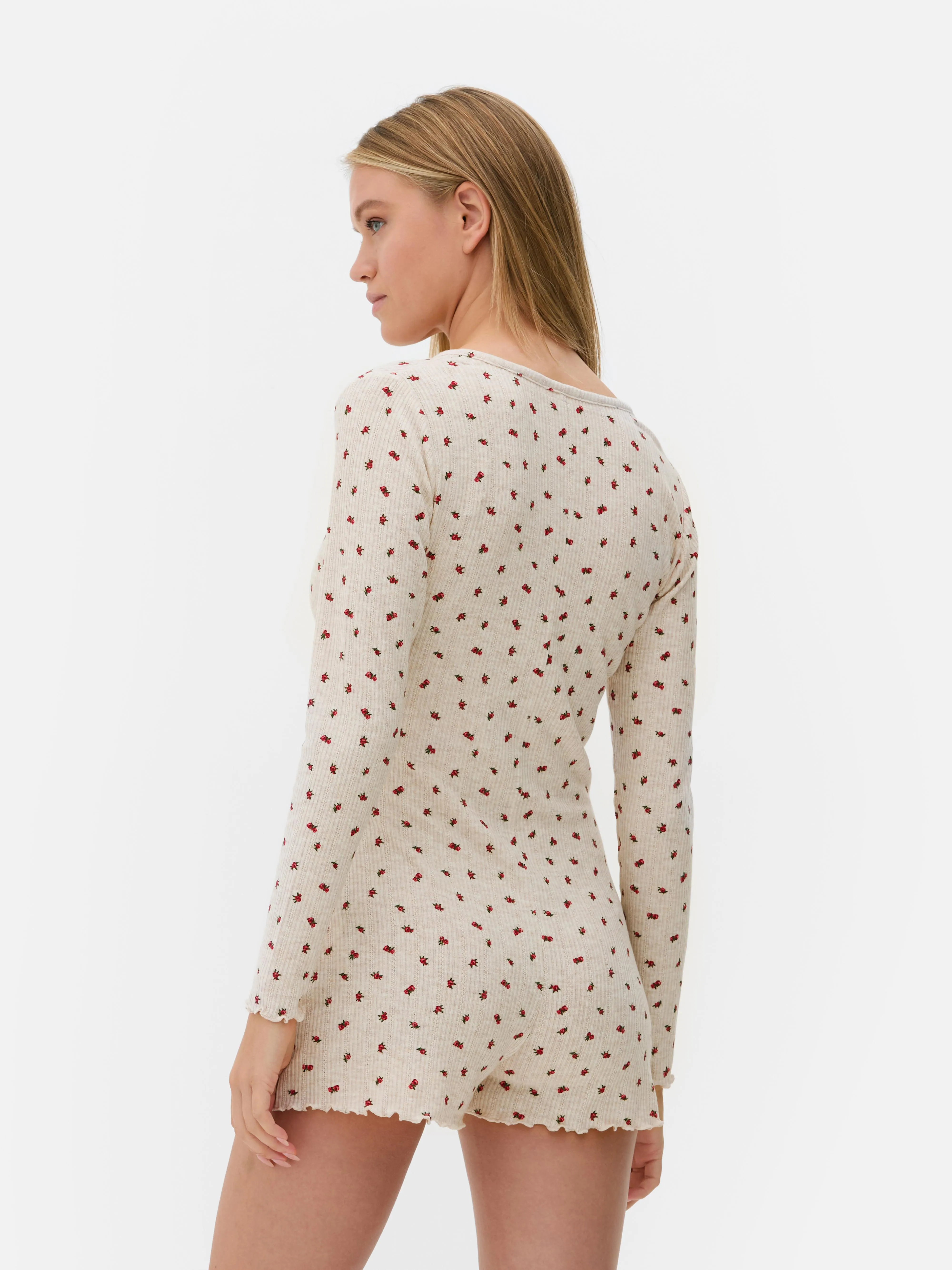 KORTE PYJAMAJUMPSUIT MET BLOEMMOTIEF