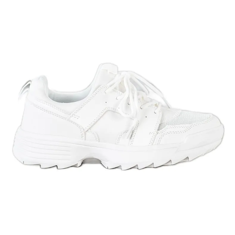 Kylie Licht witte sneakers